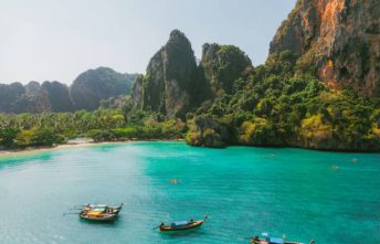 Scenic aerial view of sea kayaking near idyllic Railey beach  in Thailand
